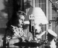 Eva at the studio.  Note the bust on her desk.  Peron?