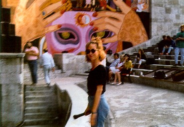 Rehearsal in outdoor theatre.  Note the interesting side murals.